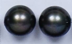 T1S simulated-pearl accessory highlighting organic shell contours and pearlescent glow