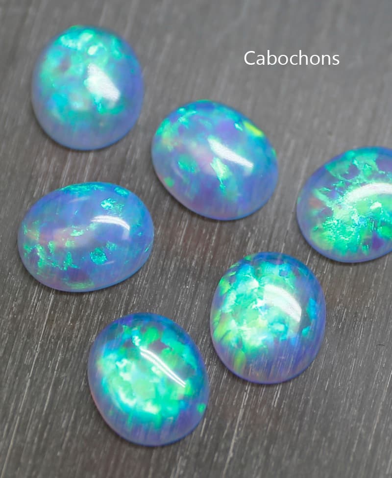 Impregnated synthetic opal cabochon OP508